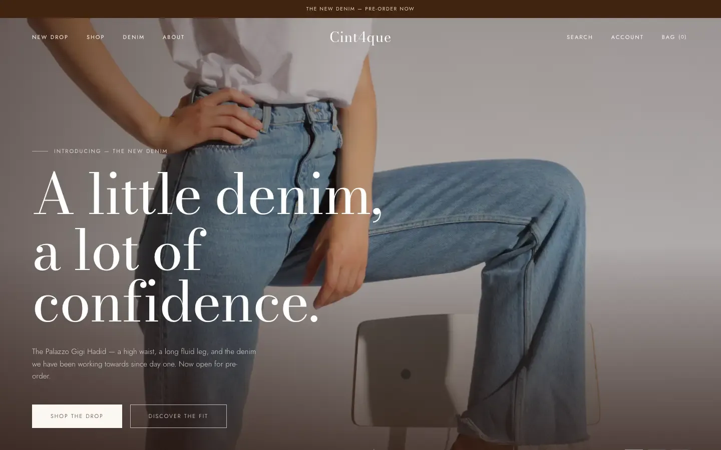 Halaman utama CINT4QUE dengan model berseluar jean kaki lebar di bawah tajuk A little denim, a lot of confidence